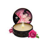 Shunga massage candle with rose petals scent and lid featuring artwork.
