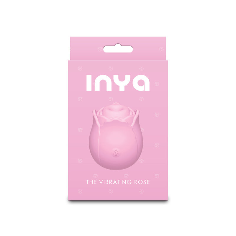 Pink rose-shaped vibrating stimulator in its packaging.