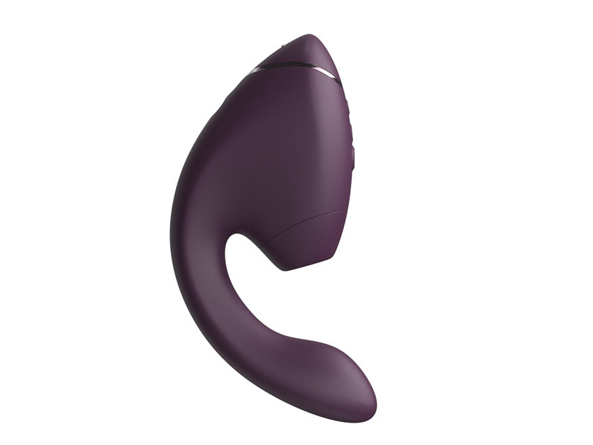 A dark purple dual clitoral and G-spot stimulator with a curved design.