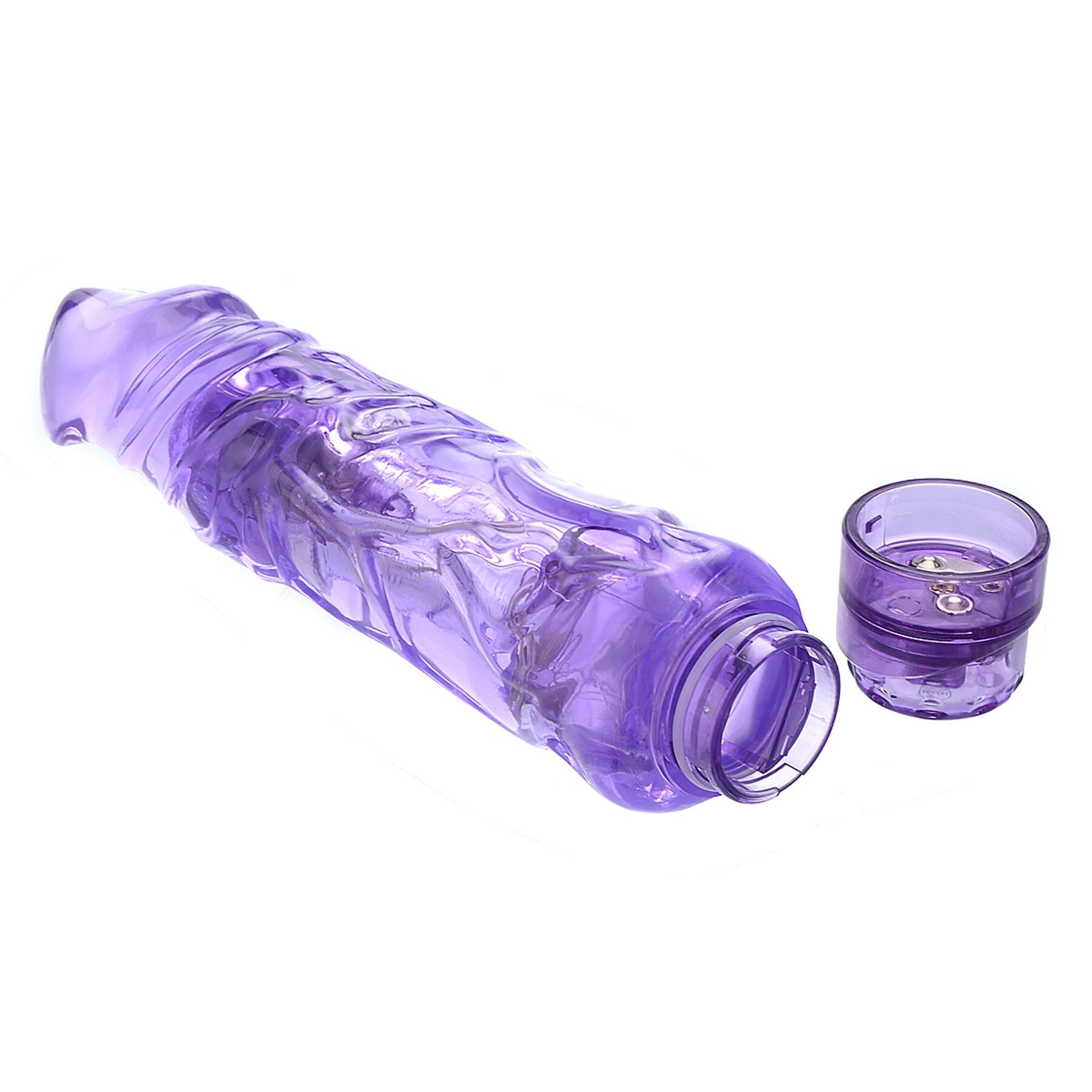 A purple textured vibrator with a removable cap.
