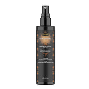 Kama Sutra Pheromone Infused Leather Body Oil spray with decorative accents.