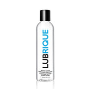 A clear bottle of Lubrique water-based personal lubricant with a black cap.