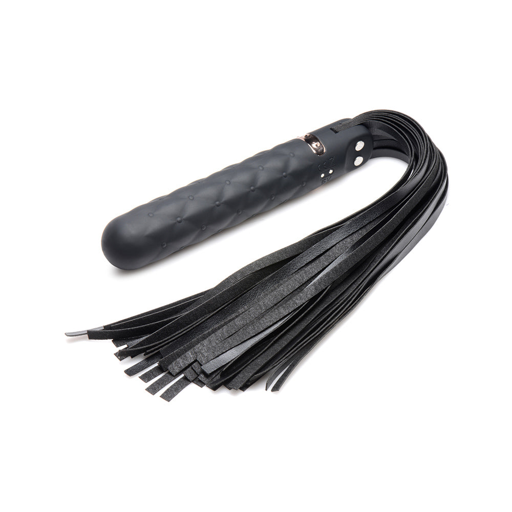 Black silicone dildo flogger with quilted texture and leather fringe.
