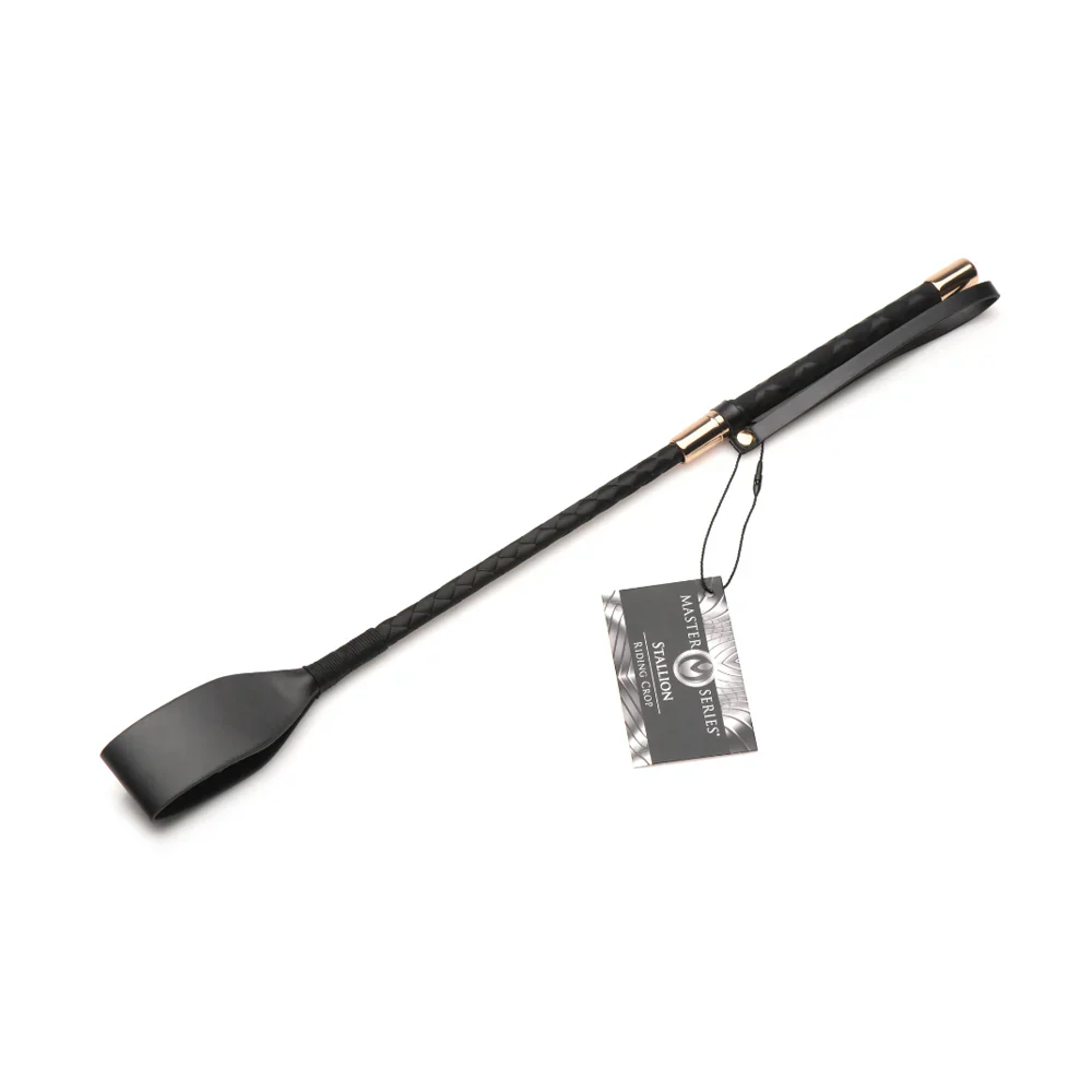 Black vegan leather riding crop with a textured grip and gold accents.