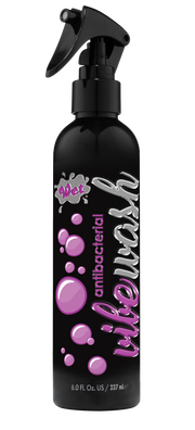 Black spray bottle of Wet Antibacterial Vibe Wash with pink bubbles and silver lettering.