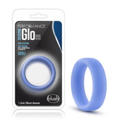 A blue silicone cock ring with a flat design, shown in packaging and on its own.