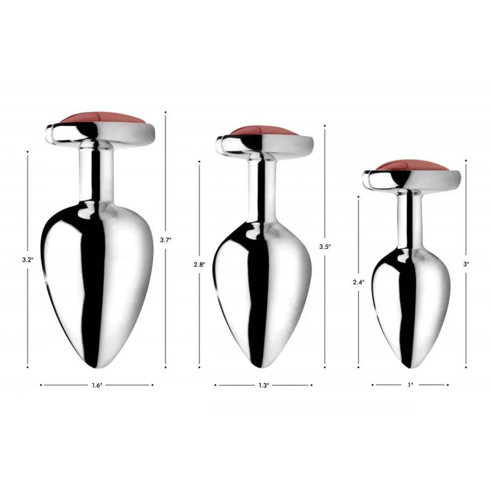 Three aluminum butt plugs with red gemstone tops, shown with measurements.