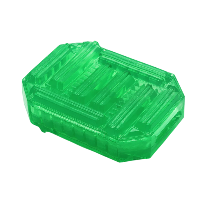 A green, rectangular, textured pleasure sleeve with ribbed details.
