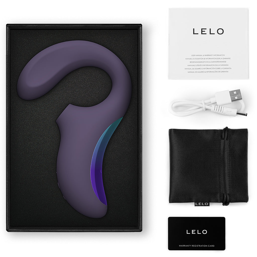 Cyber purple Lelo Enigma Wave massager with charging cable and manual.