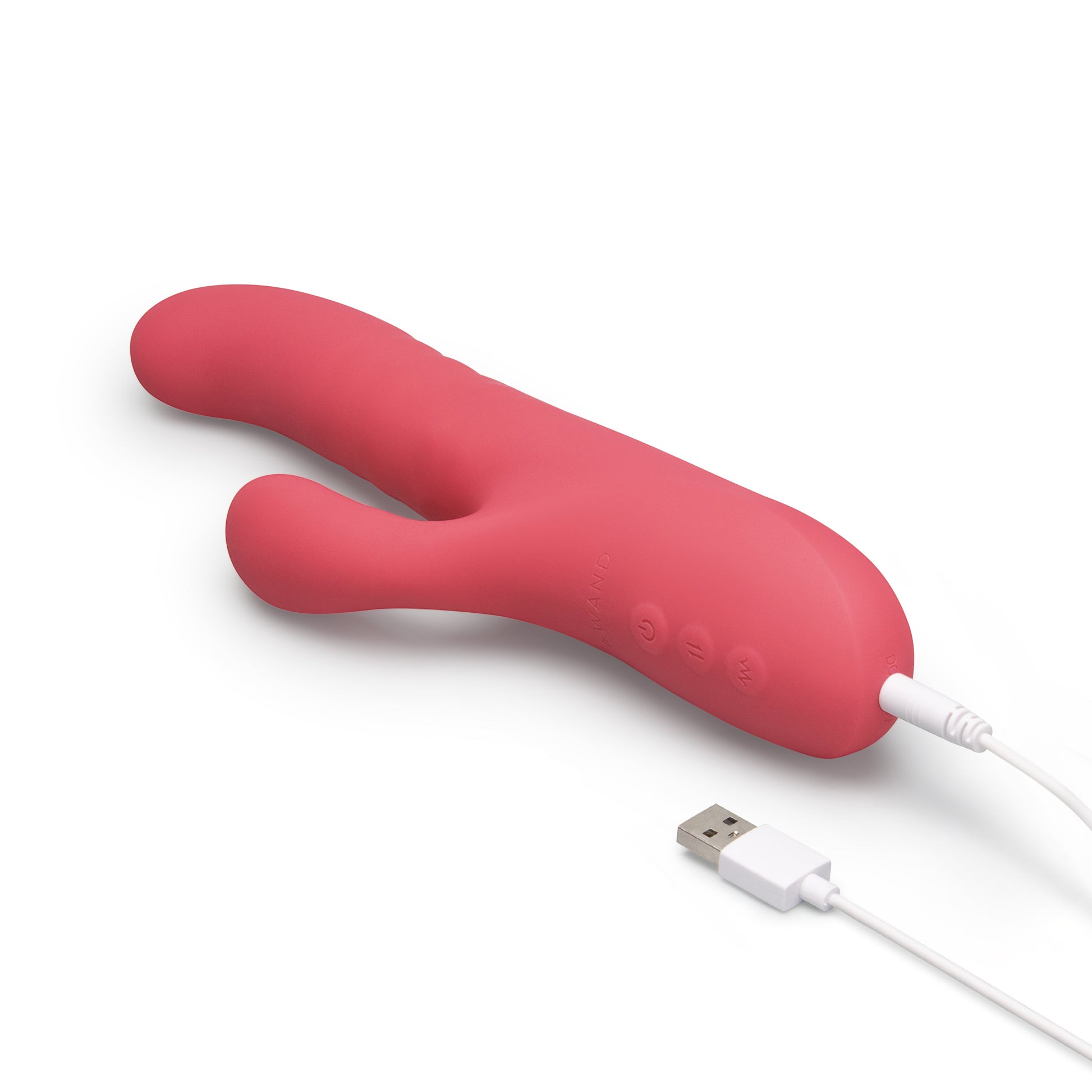 A pink silicone vibrator with a USB charging cable.