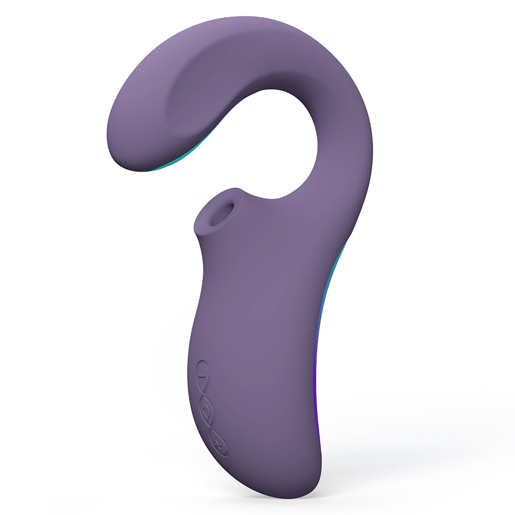Purple dual sonic massager with a curved design and buttons on the side.