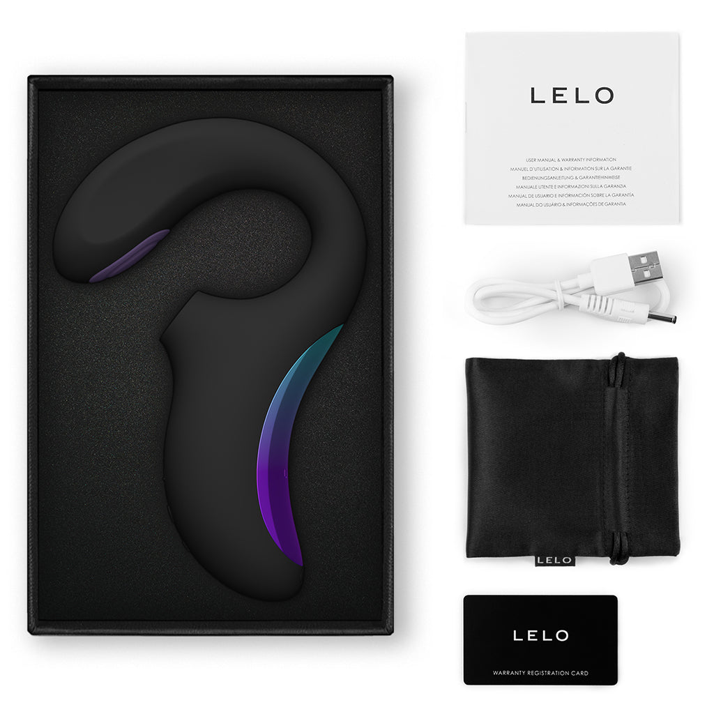 Black Lelo Enigma Double massager in a box with charging cable, pouch, and warranty card.