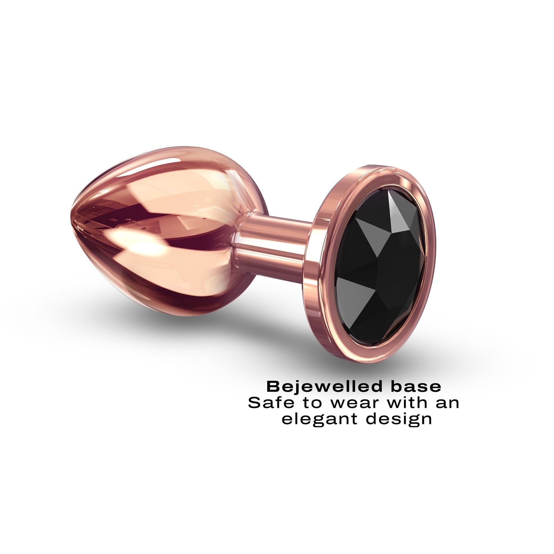 Rose gold metal anal plug with a black faceted gem on the base.