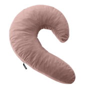 A pink crescent-shaped pillow with a soft velvet cover.