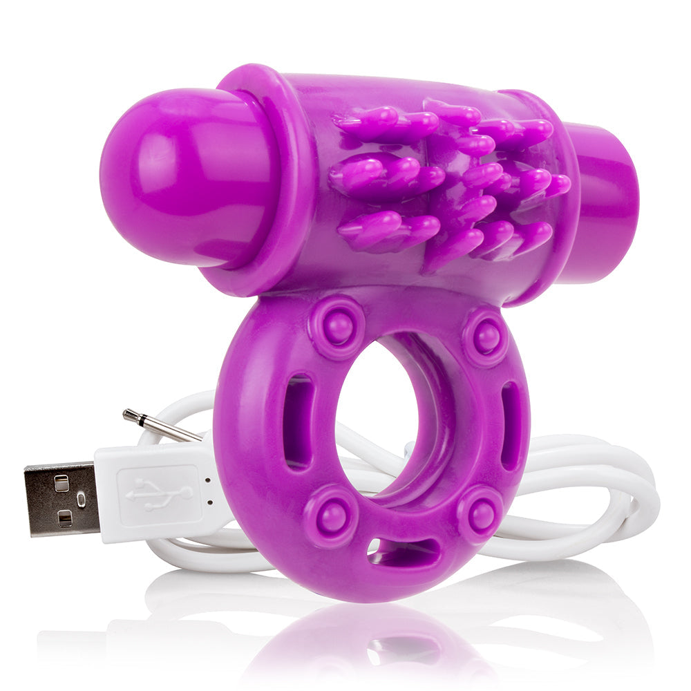 Purple vibrating cock ring with USB charging cable.
