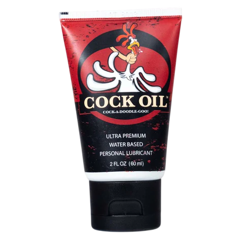 A 2 oz squeeze tube of water-based personal lubricant labeled "Cock Oil" with a cartoon rooster graphic.