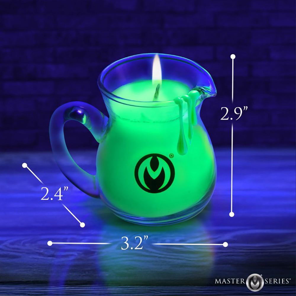 A neon green pitcher-shaped candle with a lit wick and dimensions indicated.