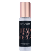 Simply Sexy Head Over Heels pheromone perfume oil roll-on with rose gold cap.