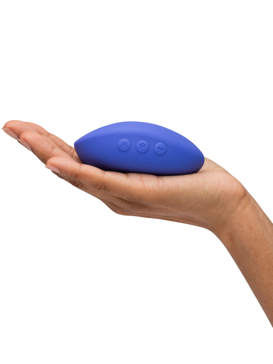 A lavender blue vibrator with heat, cool, and vibration settings rests on a hand.