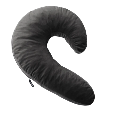 Black memory foam snuggle pillow with a curved shape.