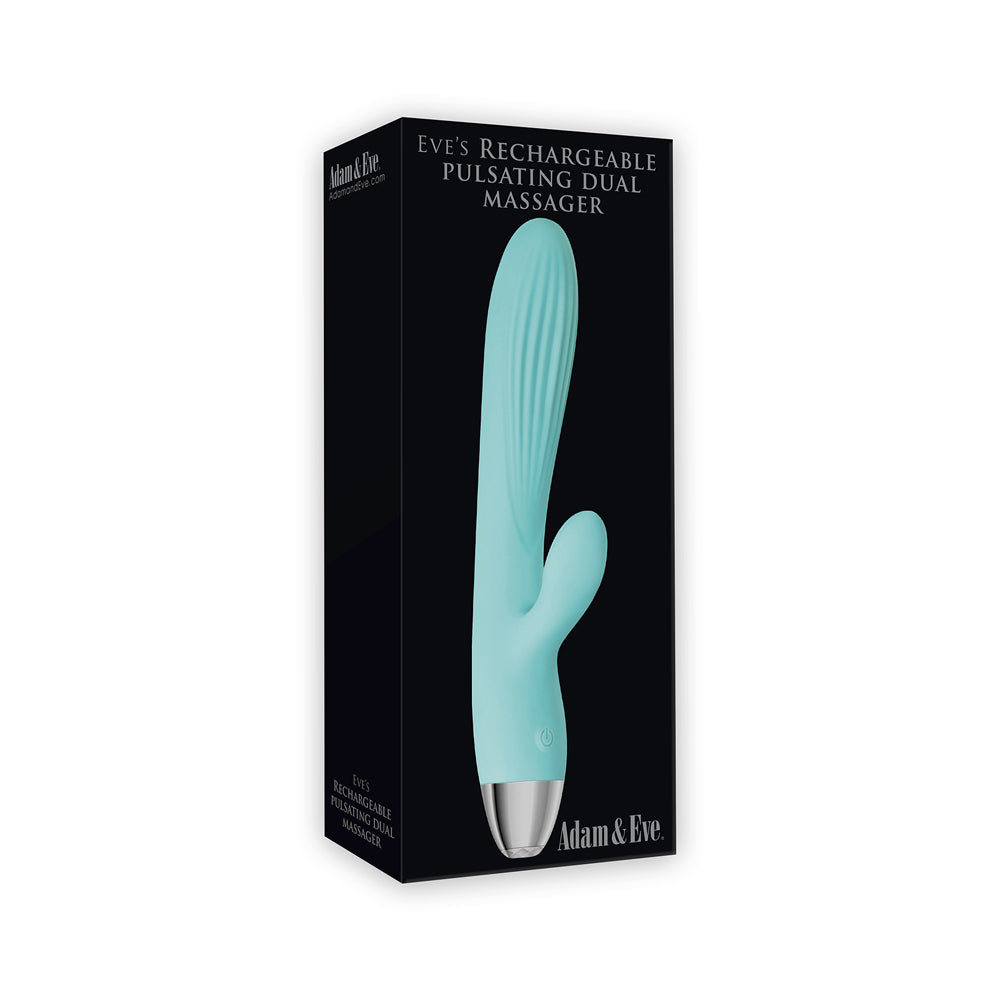 A teal dual shaft massager with a silver base on a black box.
