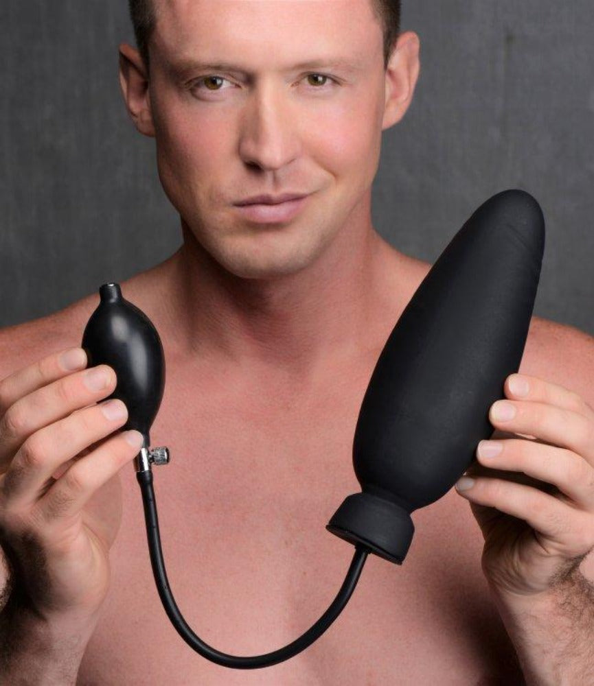Inflatable black silicone dildo with a hand pump and release valve.