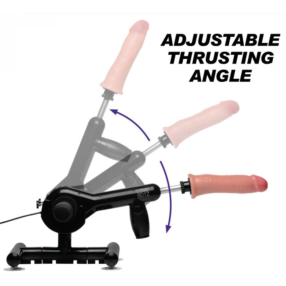 Black sex machine with adjustable thrusting angle and three dildos.