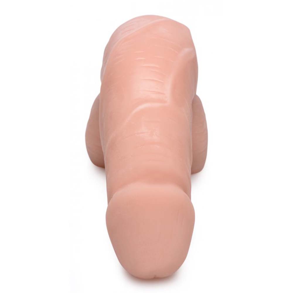 A light-toned, soft packer dildo with realistic veins.