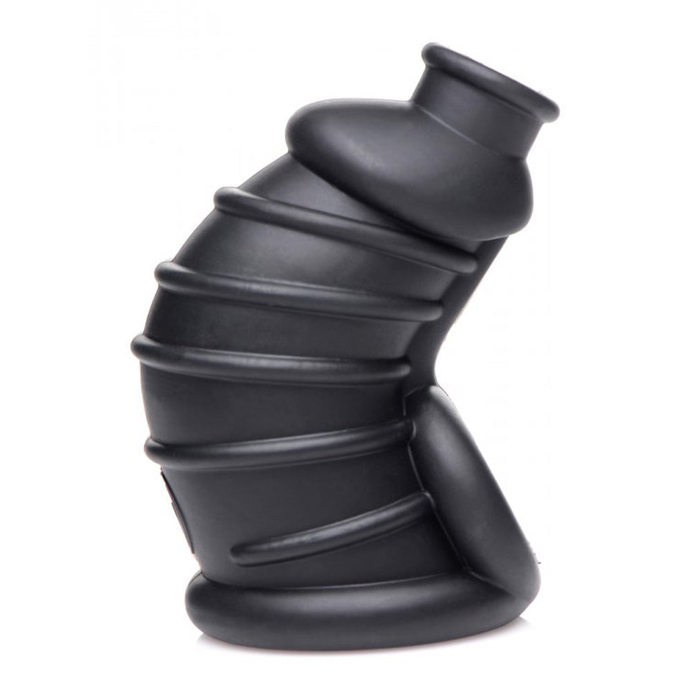 Flexible black silicone chastity cage with ribbed texture.