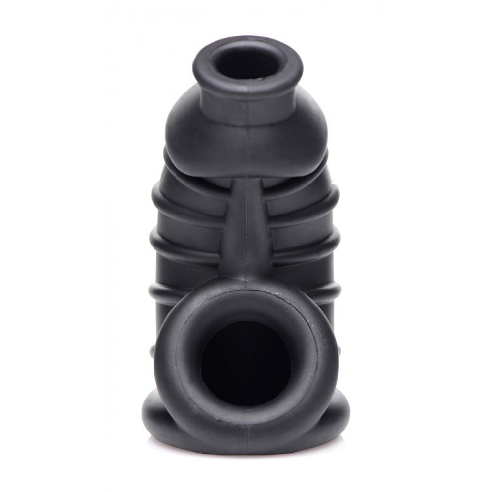 Black silicone chastity cage with ribbed texture and a ring base.