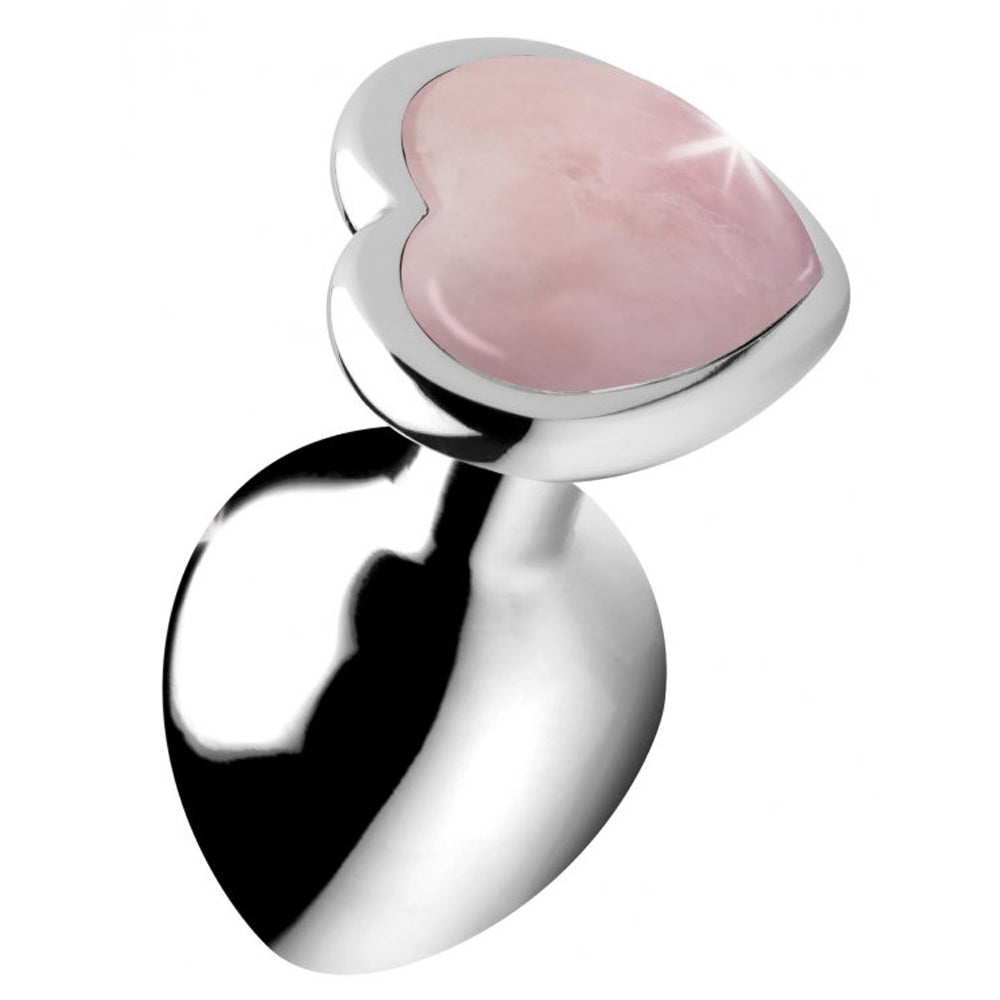 Rose quartz heart gemstone anal plug with a silver base.