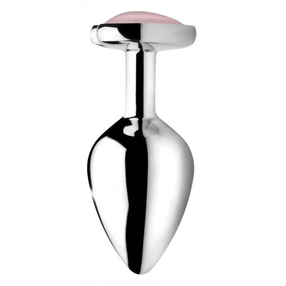Silver anal plug with a pink gemstone top.