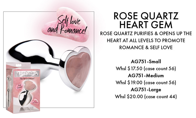 A rose quartz heart gemstone anal plug with a polished aluminum base.