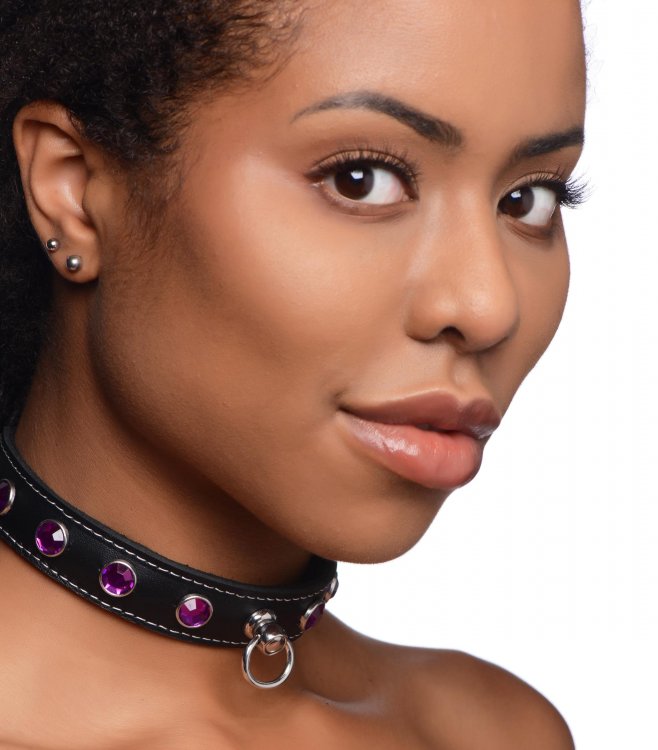 Black leather choker with purple rhinestones and an O-ring.