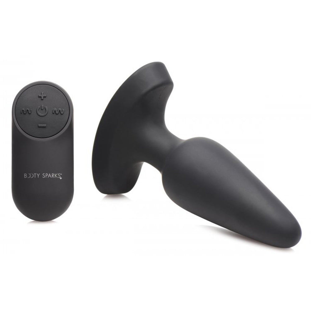 Black silicone anal plug with a remote control featuring a laser heart light.