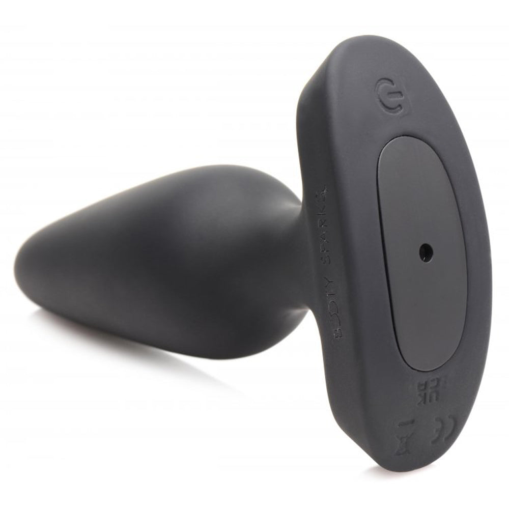 Black silicone anal plug with a remote control and laser heart light.
