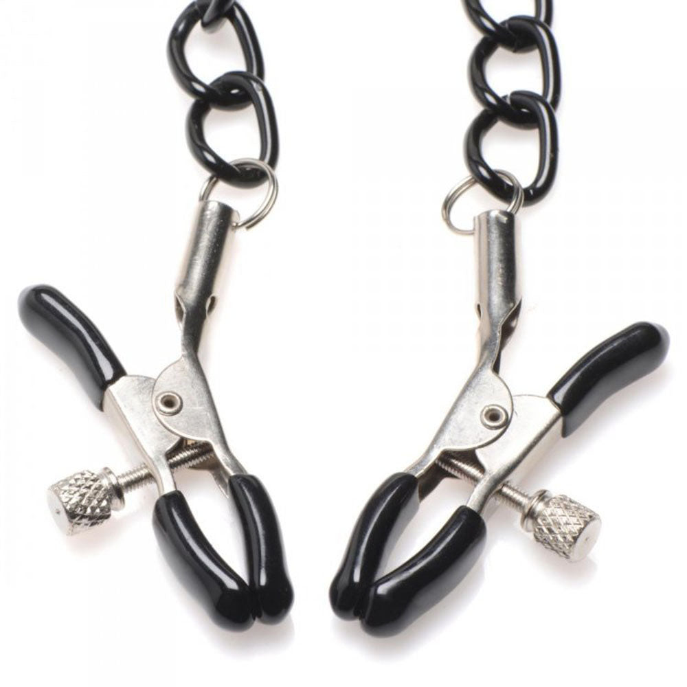 Adjustable neoprene collar with nipple clamps and chains.