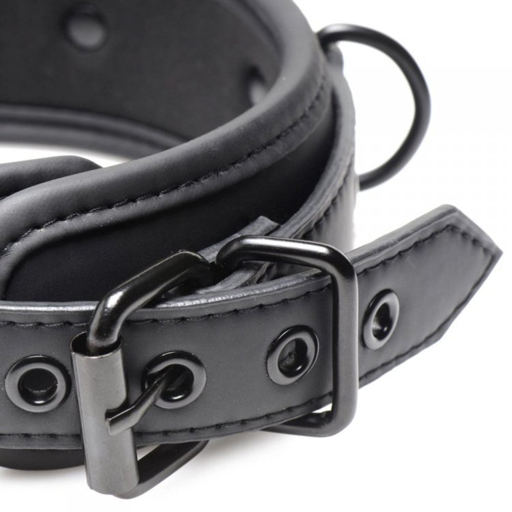 Adjustable black neoprene collar with metal buckle and D-ring.