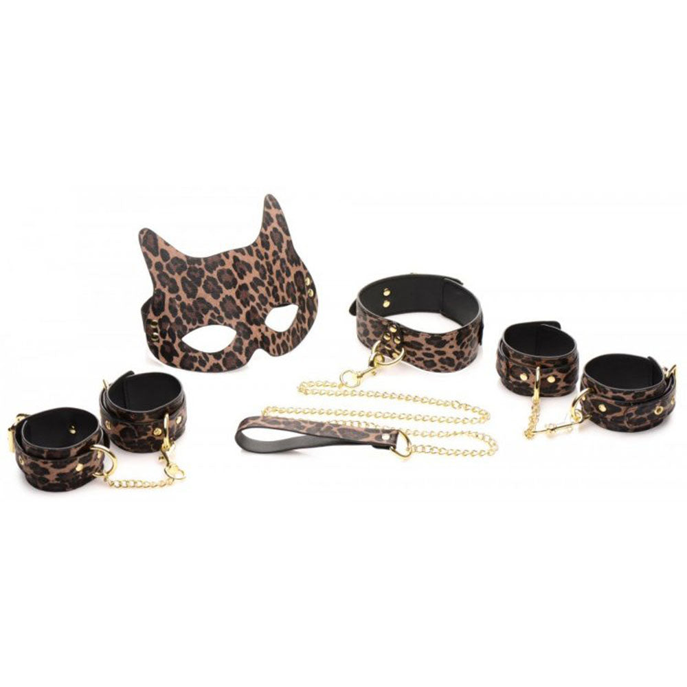 Leopard print faux leather bondage set with mask, collar, leash, and cuffs.
