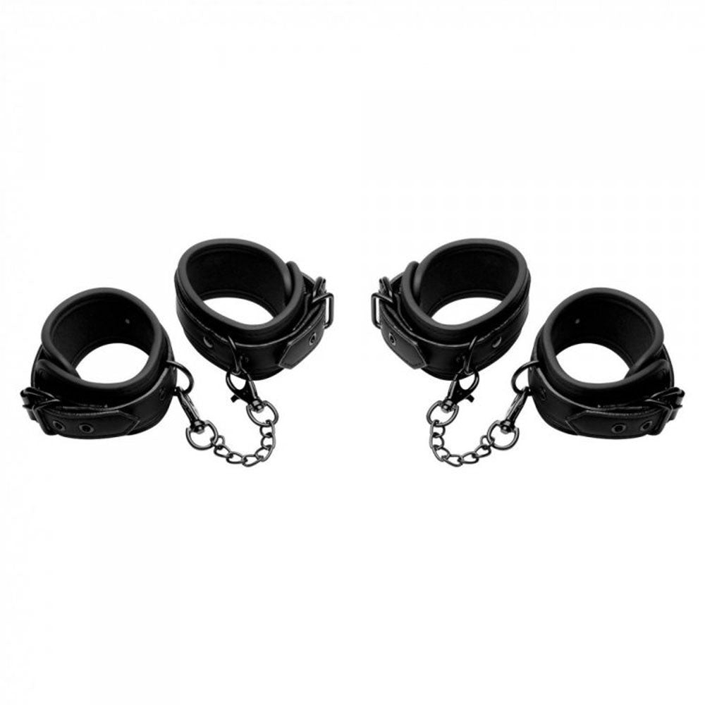 Black faux leather wrist and ankle cuffs with chains.