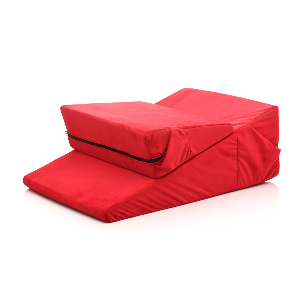 Red velvet foam wedge pillow set with zipper detail.