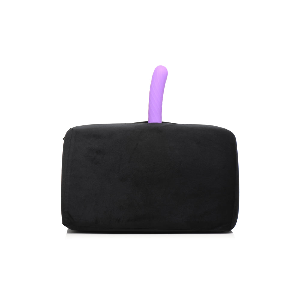 Black velvet saddle cushion with a purple toy in the pocket.