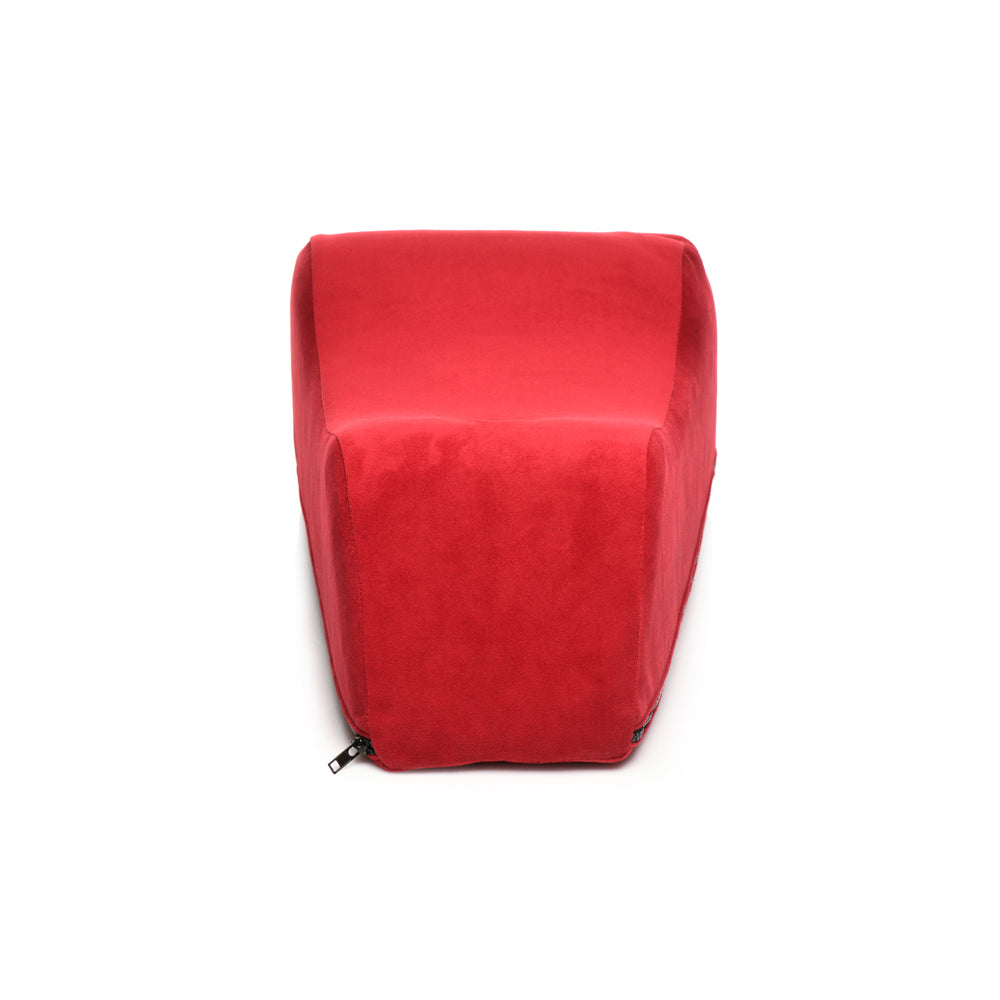 Red velvet foam positioning pillow with a zipper on the side.