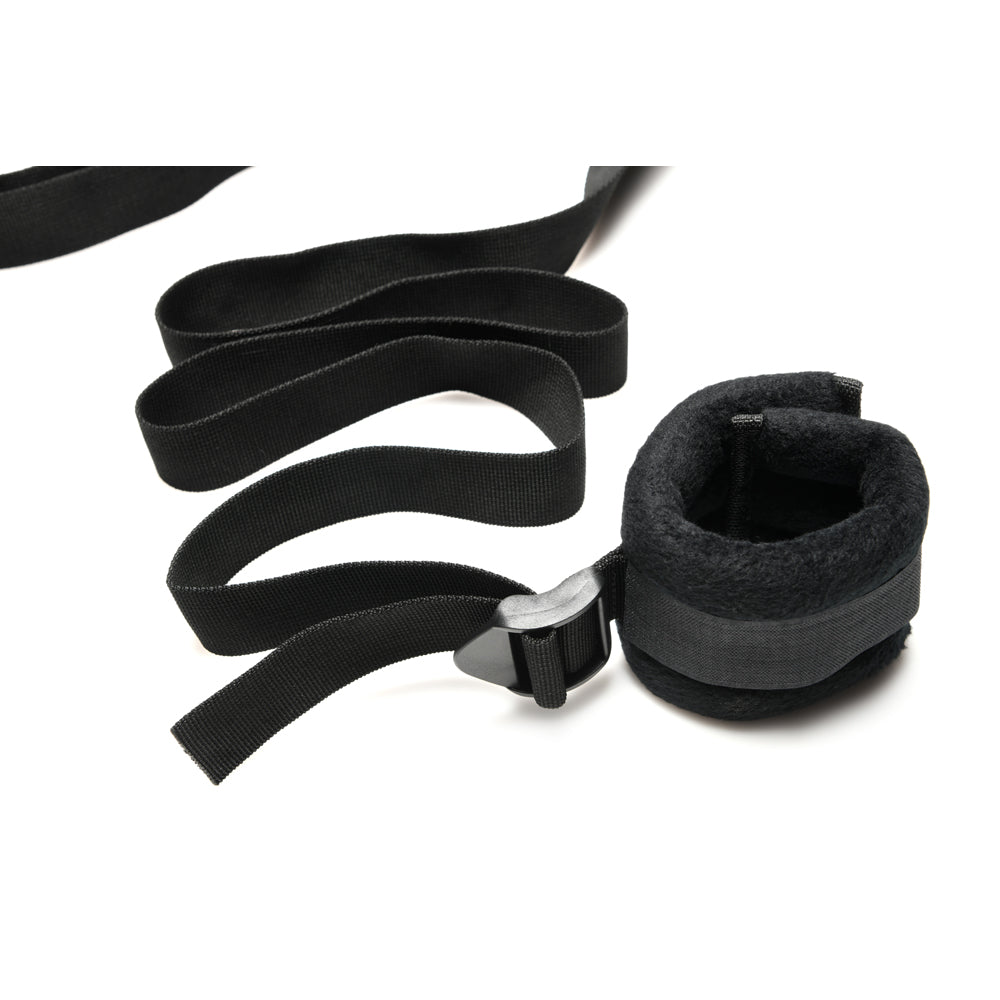 Black padded cuff with adjustable strap and buckle.