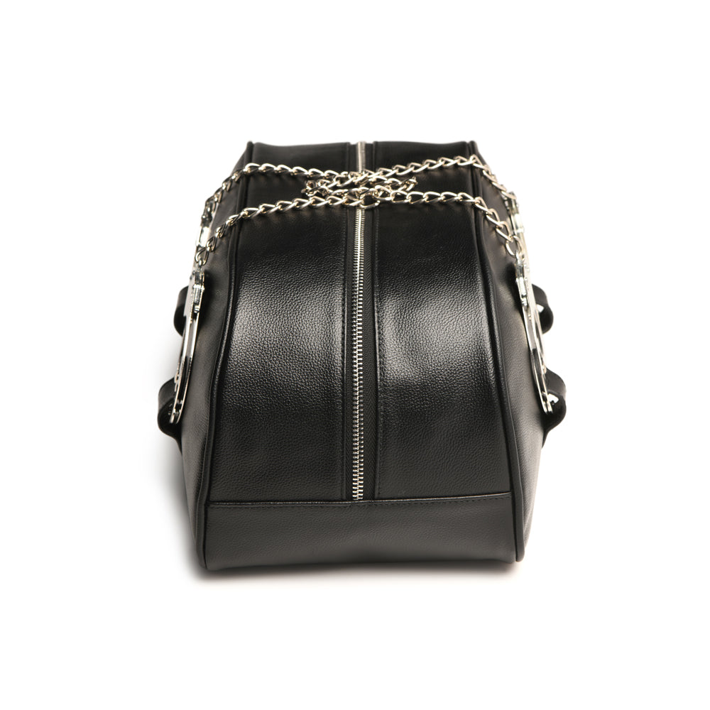 Black vegan leather travel bag with chain and handcuff accents.