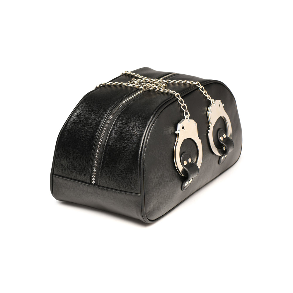 Black vegan leather travel bag with handcuffs and chain.