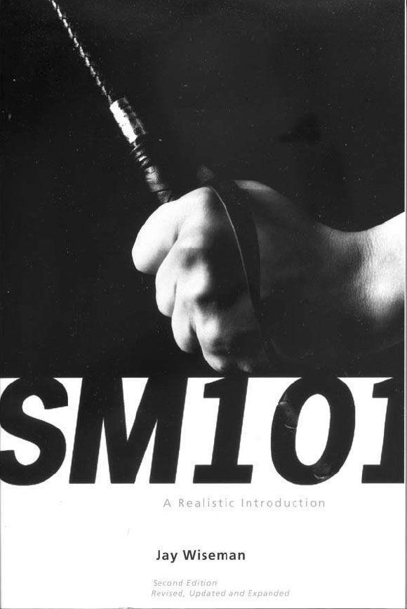 Book cover for SM 101 by Jay Wiseman, featuring a hand holding a flogger.