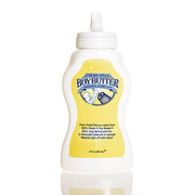 A white squeeze bottle of Boy Butter personal lubricant with a yellow label.