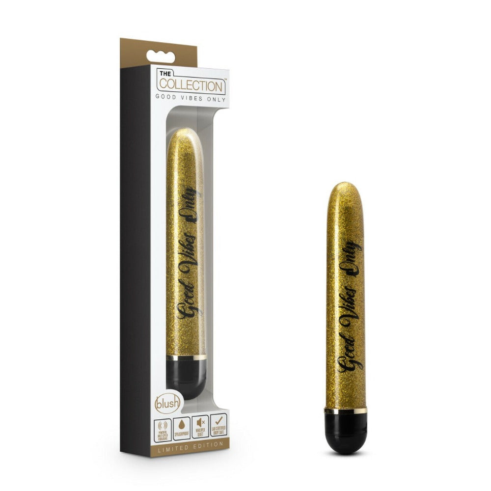 A gold glitter vibrator with "Good Vibes Only" text in its packaging.
