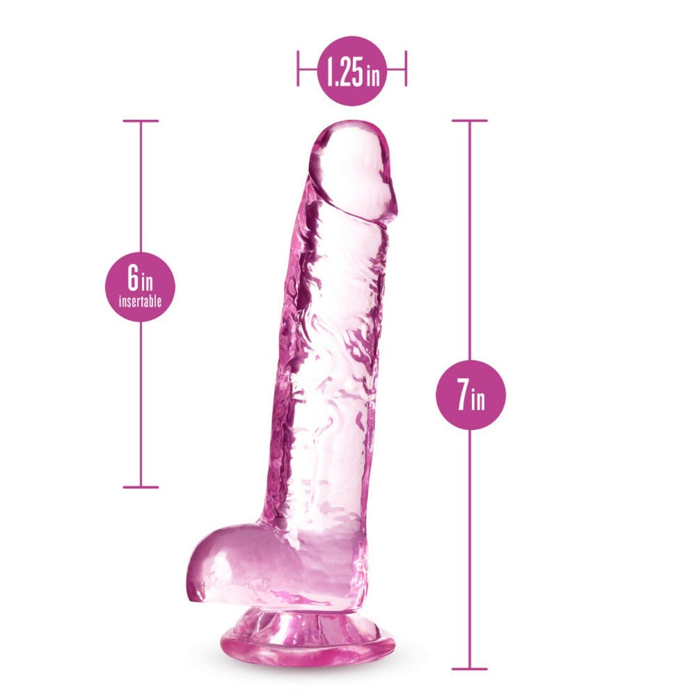 7-inch blush crystalline lifelike dildo with suction cup base and 1.25-inch width.